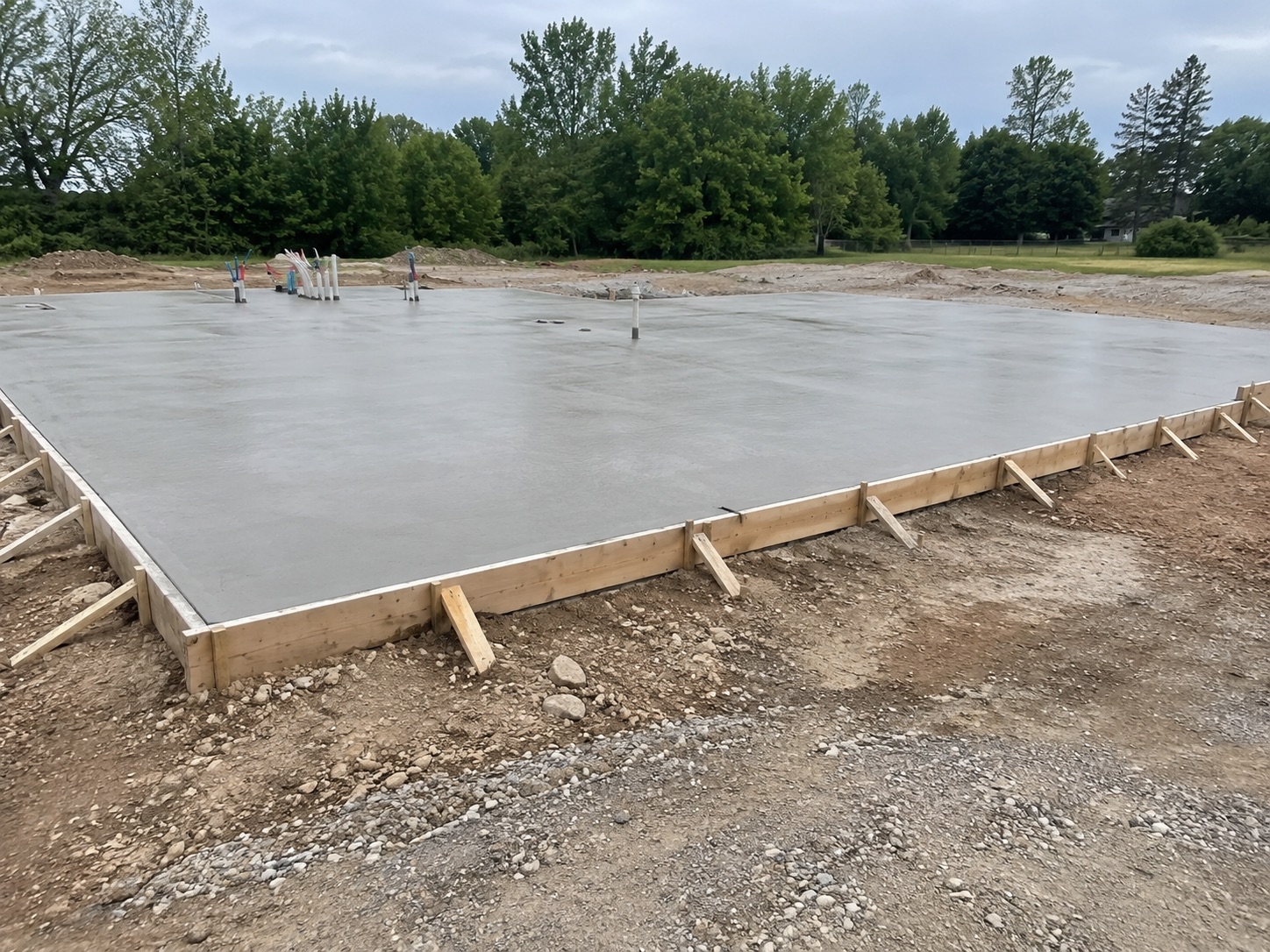 Finishing and curing colored concrete