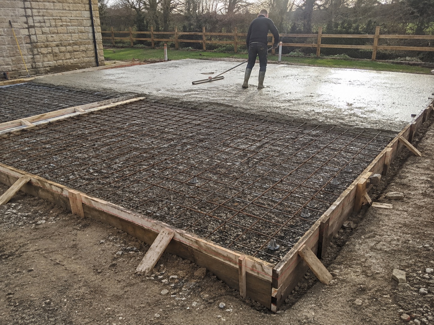Site preparation and grading for a foundation